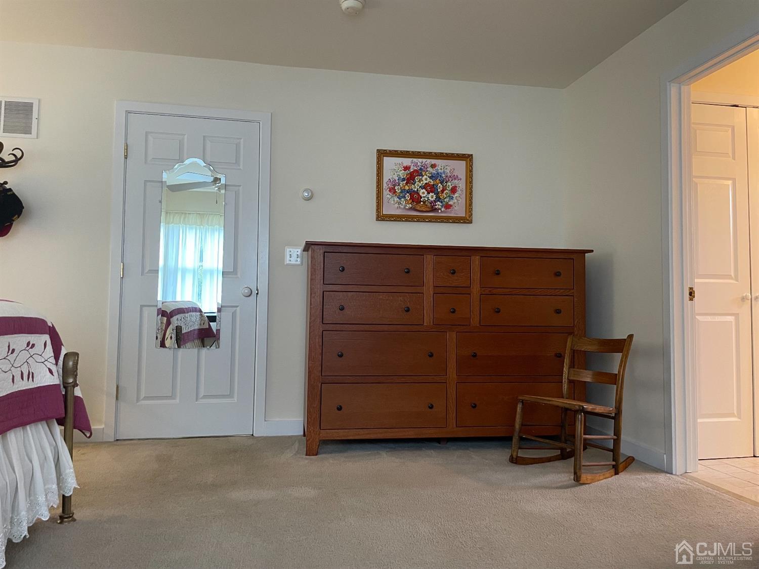 234 Morganville Road Old Bridge, NJ 07747 - Photo 28 of 52 a view of a bedroom with closet and cabinet