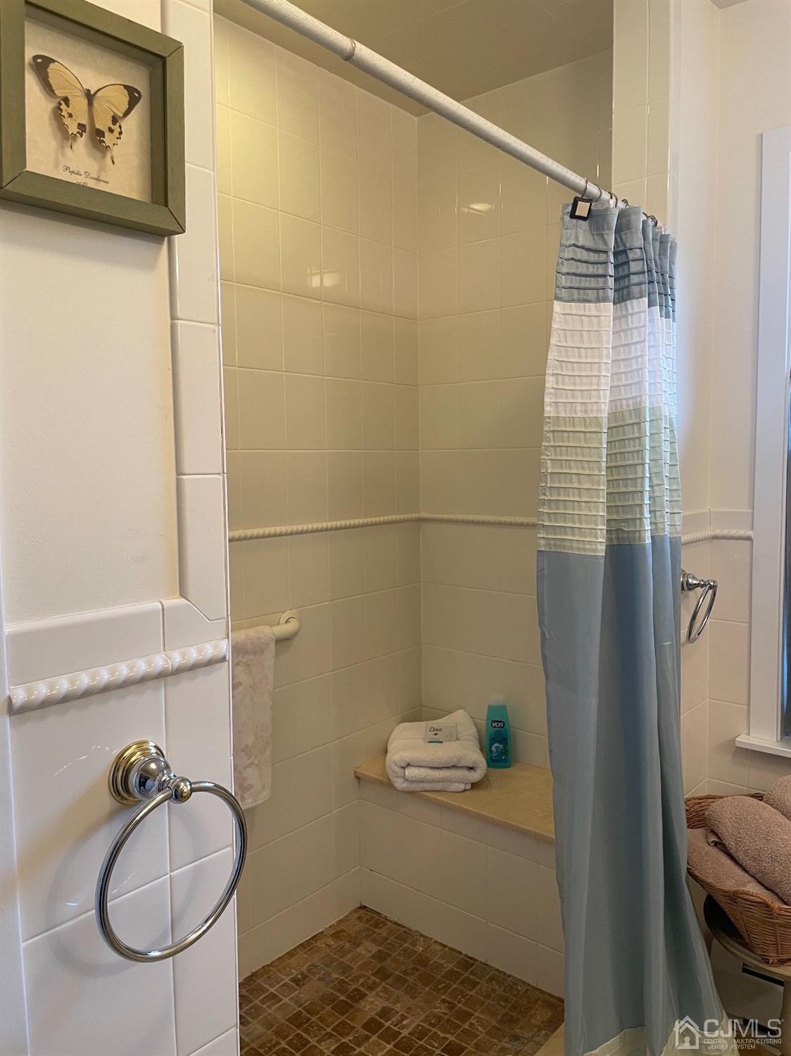 234 Morganville Road Old Bridge, NJ 07747 - Photo 33 of 52 a bathroom with a shower