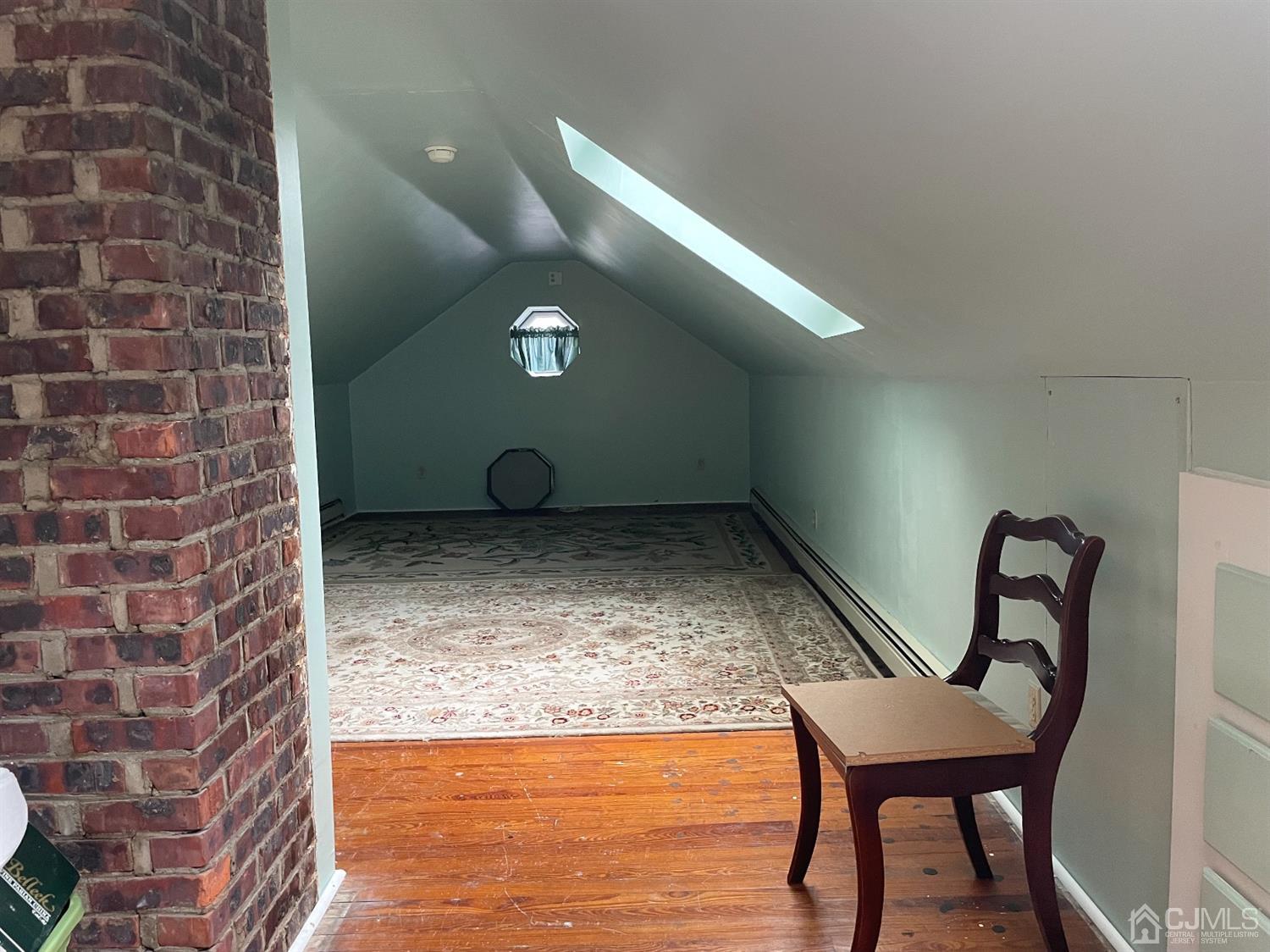 234 Morganville Road Old Bridge, NJ 07747 - Photo 41 of 52 a view of a livingroom with furniture and staircase