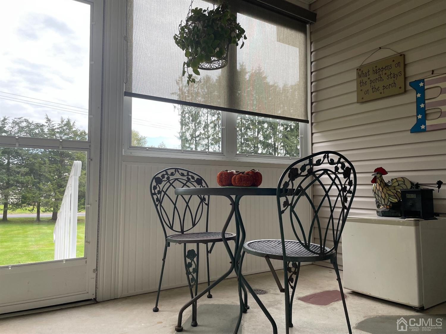 234 Morganville Road Old Bridge, NJ 07747 - Photo 43 of 52 a view of a chairs and table in the balcony