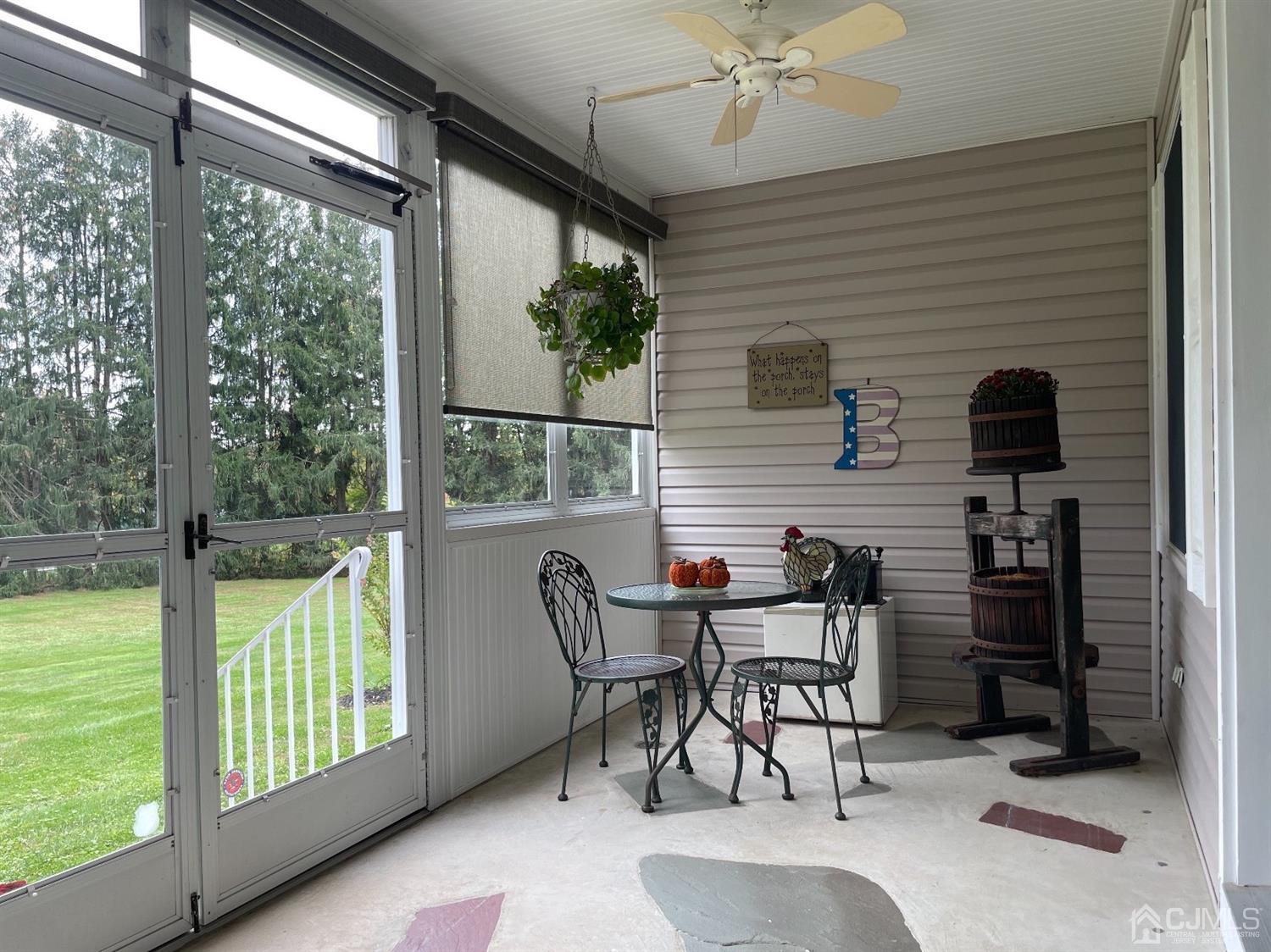 234 Morganville Road Old Bridge, NJ 07747 - Photo 44 of 52 a view of a porch with furniture and a yard