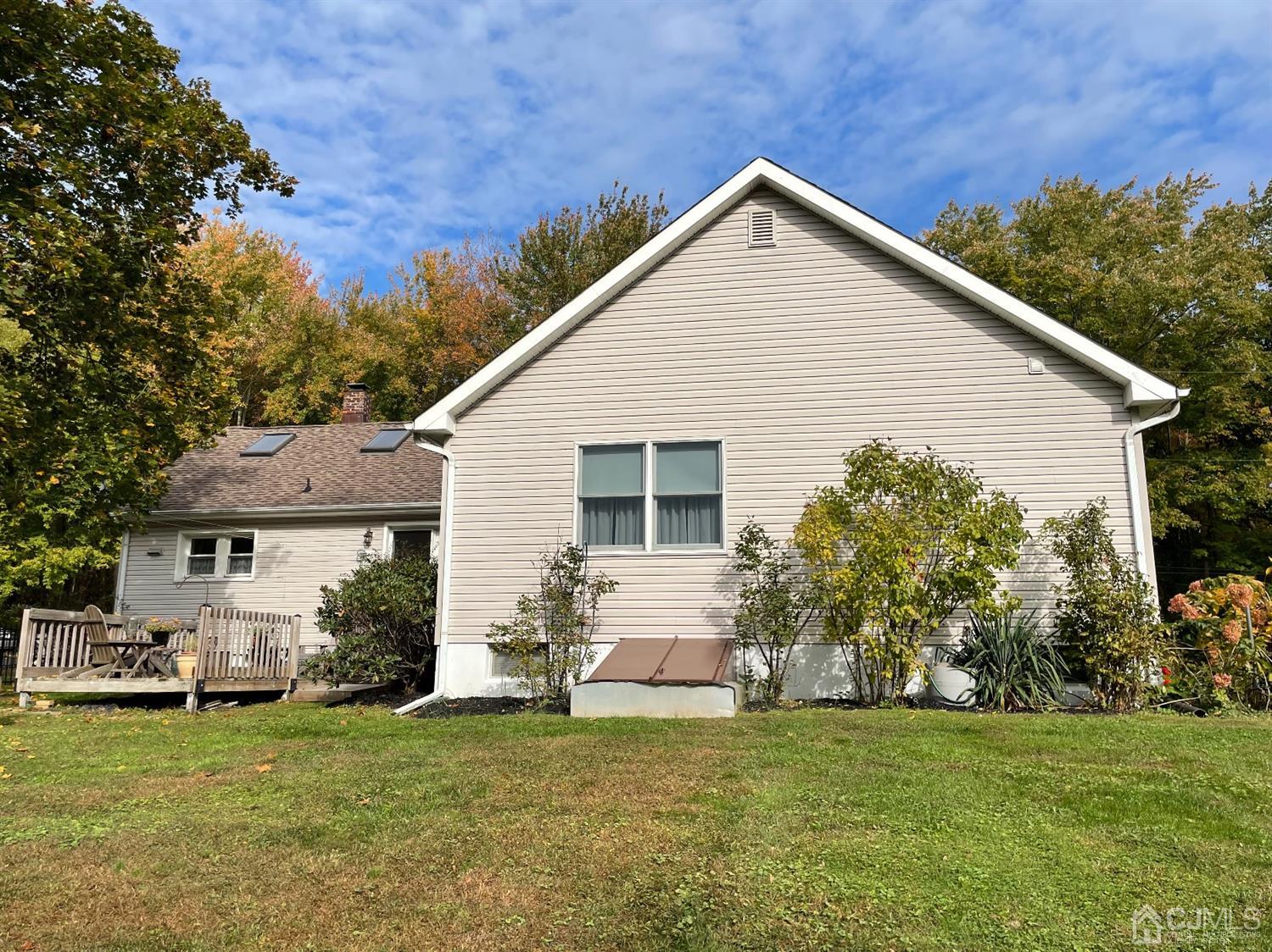 234 Morganville Road Old Bridge, NJ 07747 - Photo 10 of 52 a view of a house with a yard