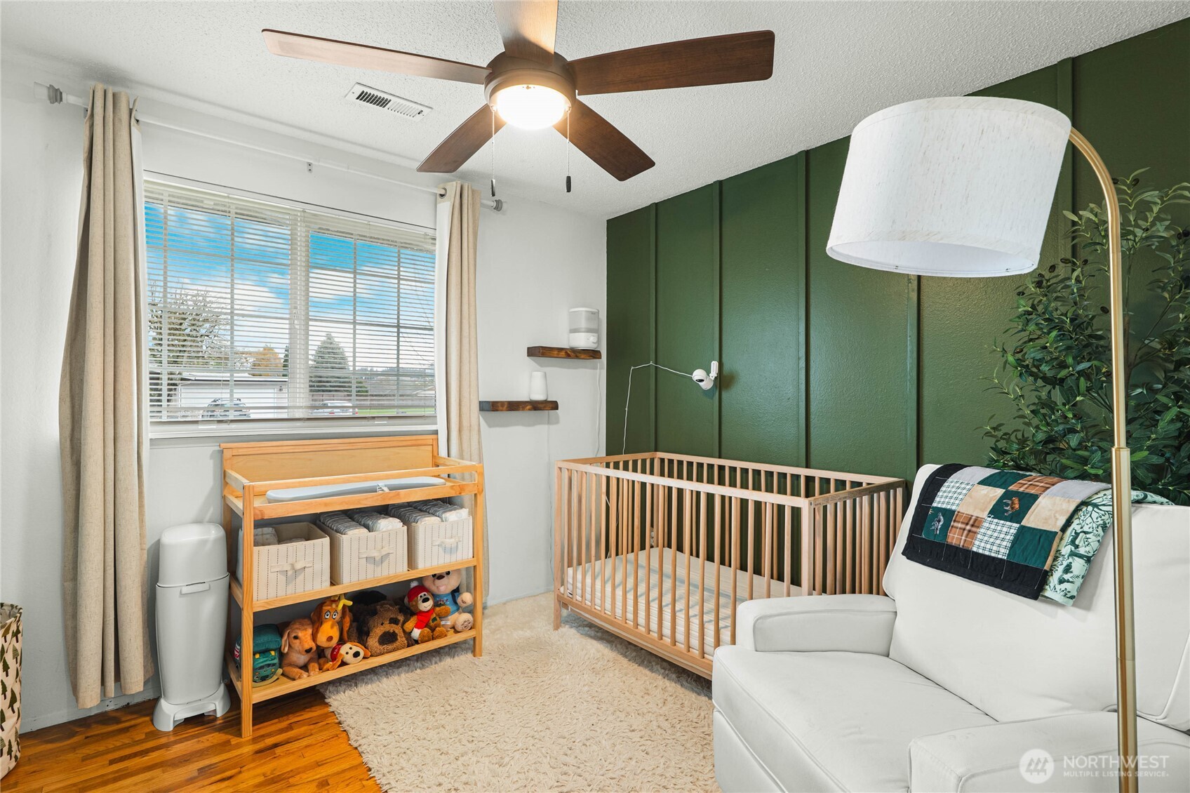 924 9th Street Southwest Puyallup, WA 98371 - Photo 17 of 38 a bedroom with furniture and a window