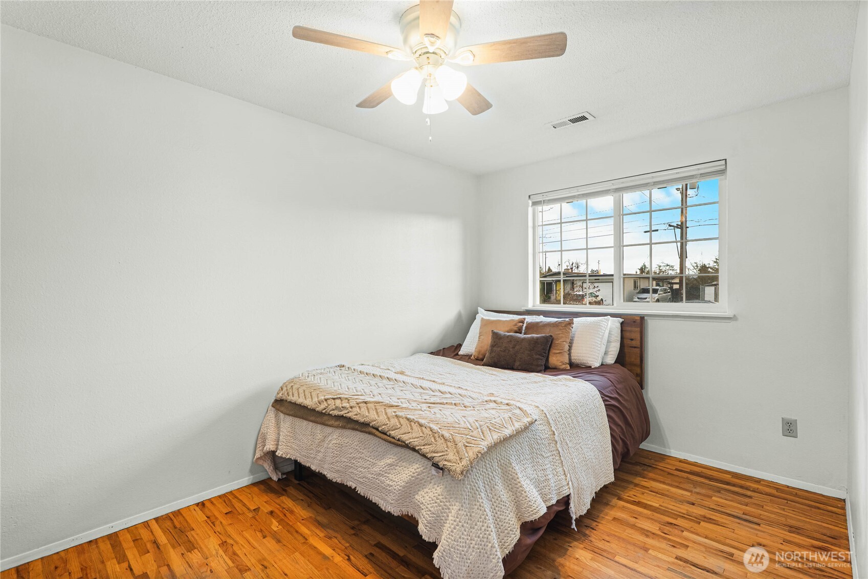 924 9th Street Southwest Puyallup, WA 98371 - Photo 24 of 38 a bedroom with a bed and a window