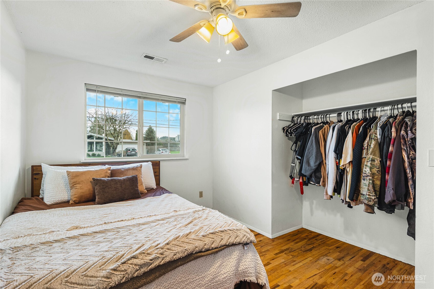 924 9th Street Southwest Puyallup, WA 98371 - Photo 25 of 38 a bedroom with a bed and a window