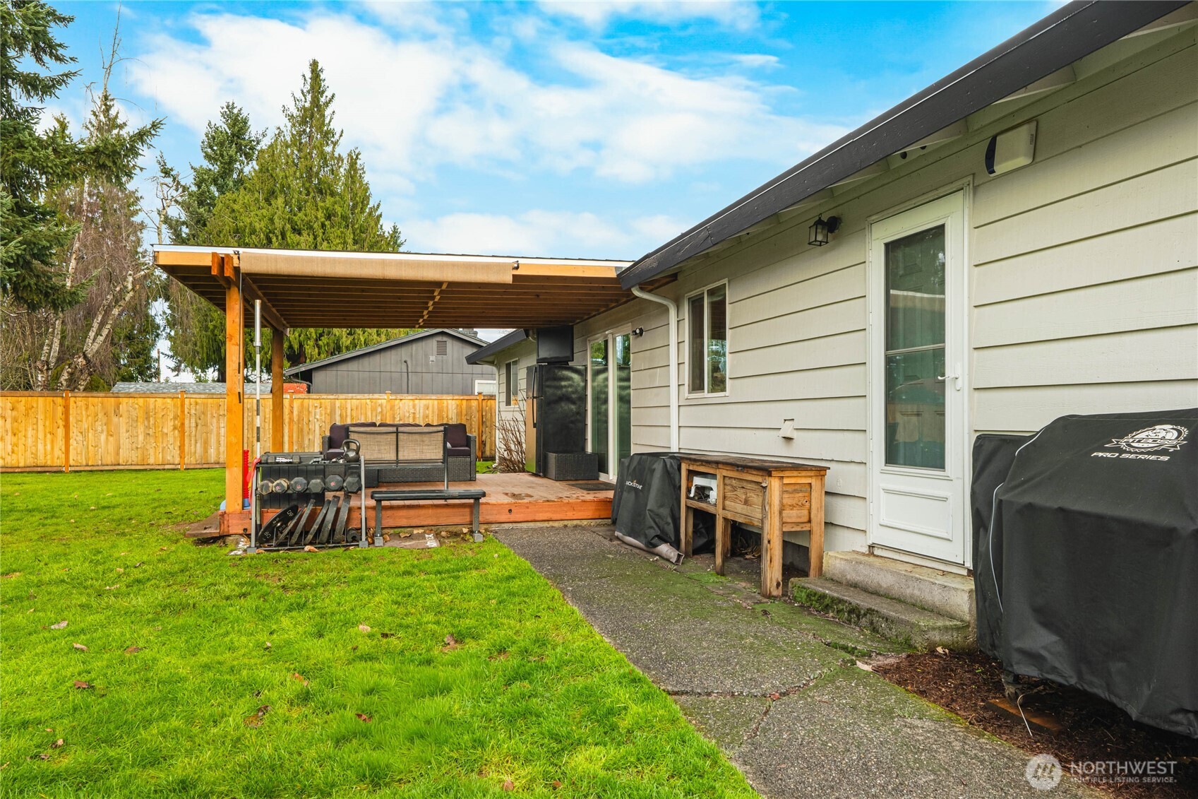 924 9th Street Southwest Puyallup, WA 98371 - Photo 32 of 38 a view of a two chairs in a patio
