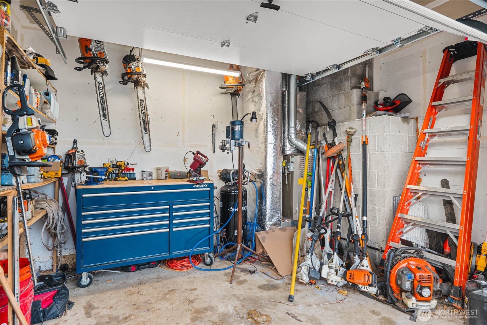 924 9th Street Southwest Puyallup, WA 98371 - Photo 33 of 38 a view of walk in closet with clothes