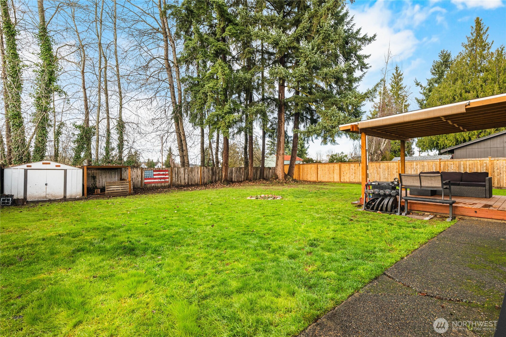924 9th Street Southwest Puyallup, WA 98371 - Photo 34 of 38 a view of a backyard with sitting area