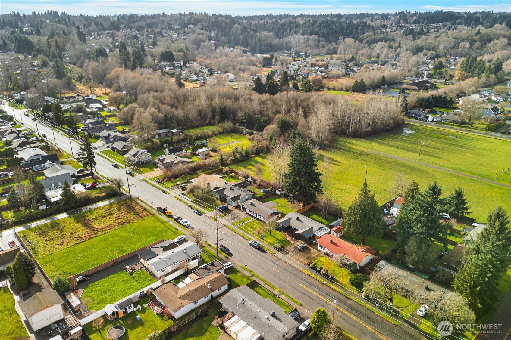 924 9th Street Southwest Puyallup, WA 98371 - Photo 36 of 38 an aerial view of residential houses with outdoor space