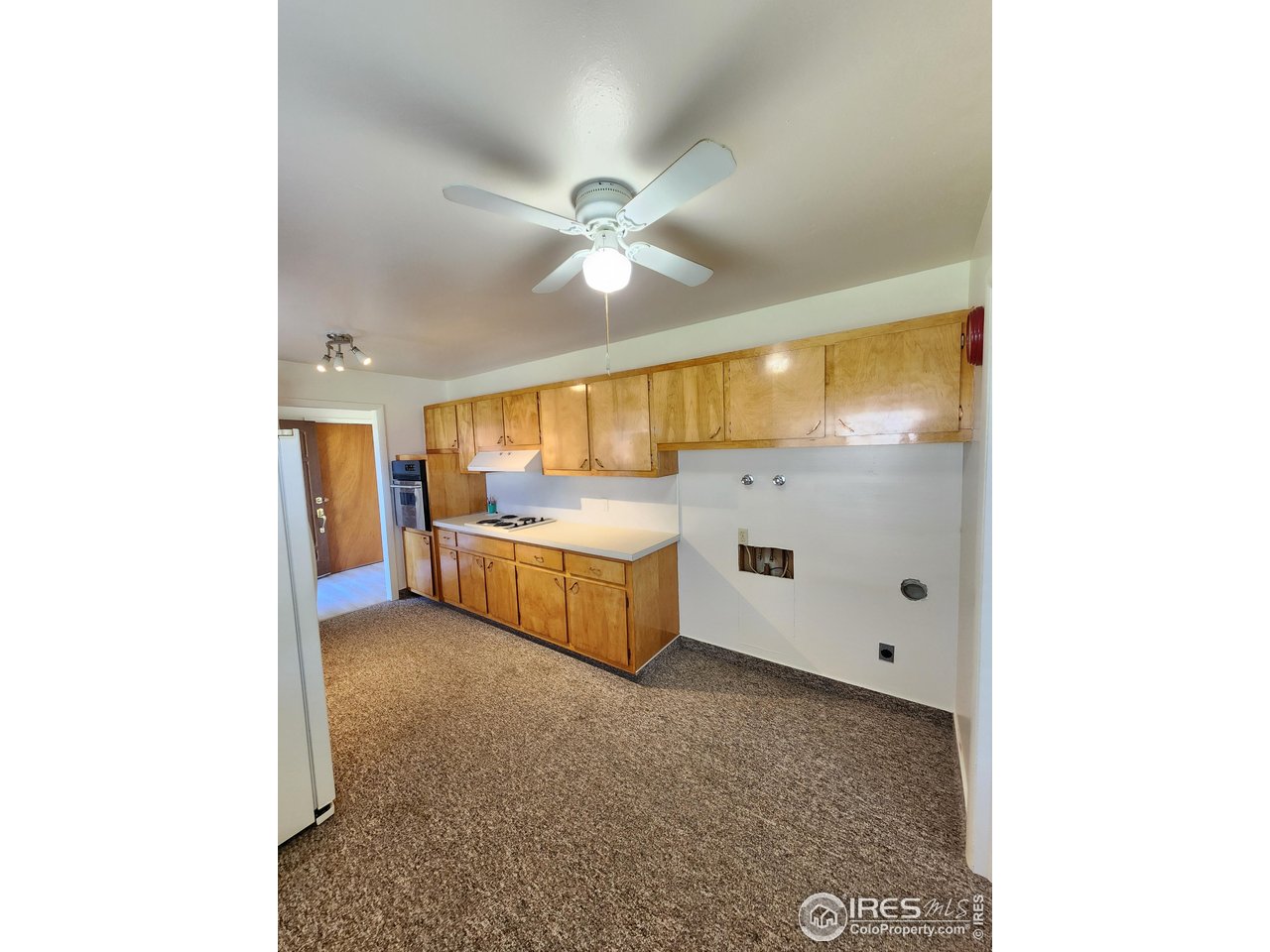 1107 Delmar Street Sterling, CO 80751 - Photo 21 of 49 a spacious bathroom with a double vanity sink and a mirror