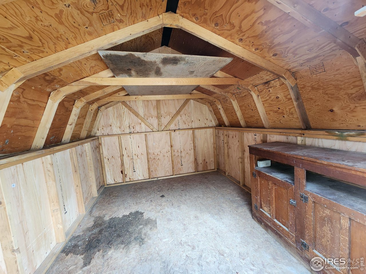 1107 Delmar Street Sterling, CO 80751 - Photo 34 of 49 a view of walk in closet with clothes