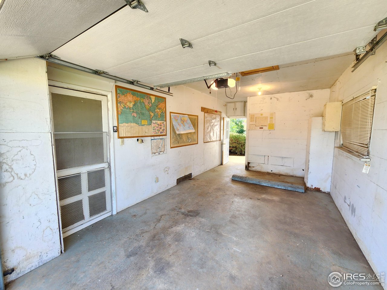 1107 Delmar Street Sterling, CO 80751 - Photo 41 of 49 a view of an empty room with a window