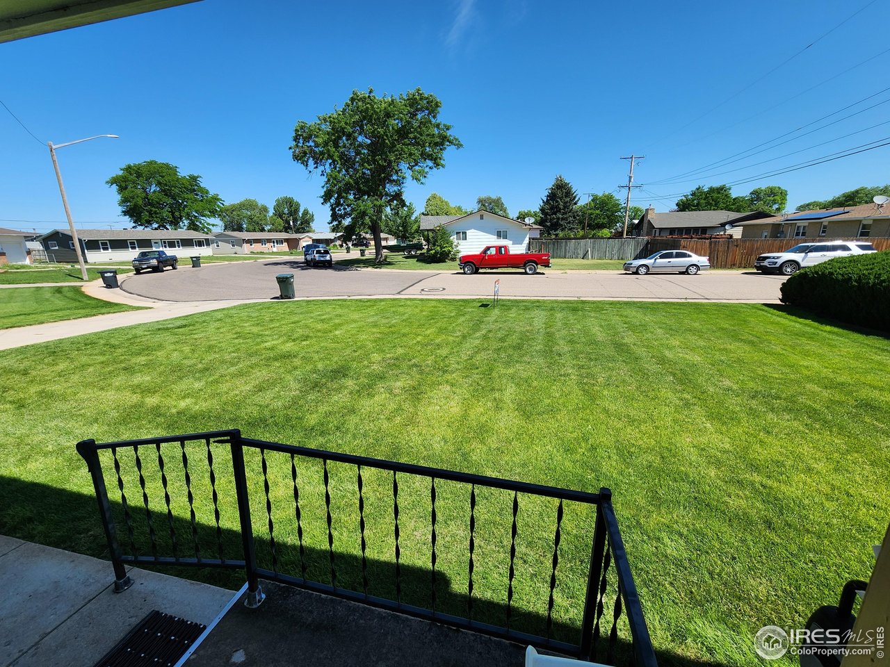 1107 Delmar Street Sterling, CO 80751 - Photo 45 of 49 a view of a garden with an outdoor seating