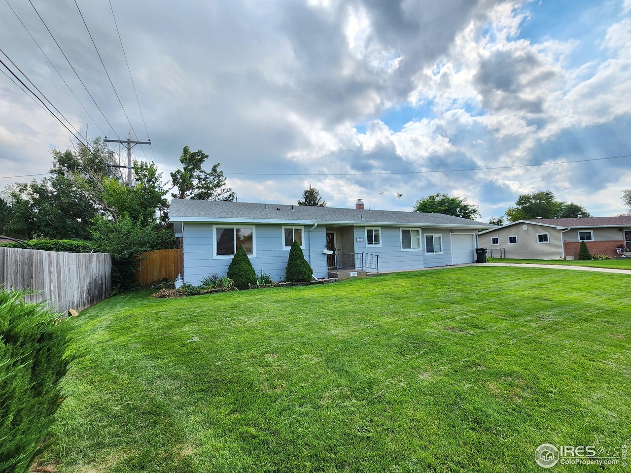 1107 Delmar Street Sterling, CO 80751 - Photo 49 of 49 a view of a house with a back yard