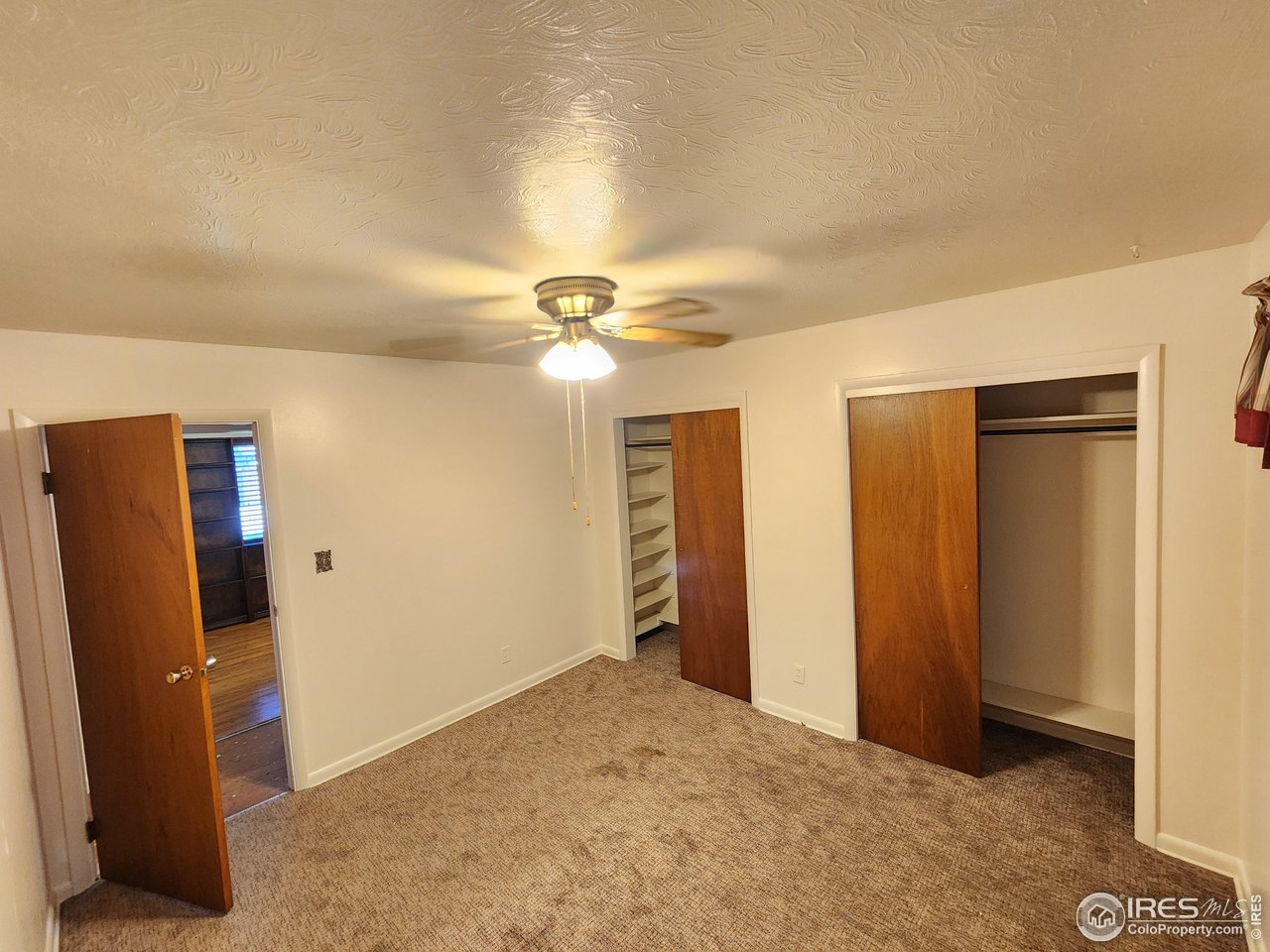 1107 Delmar Street Sterling, CO 80751 - Photo 8 of 49 a view of a livingroom with a chandelier