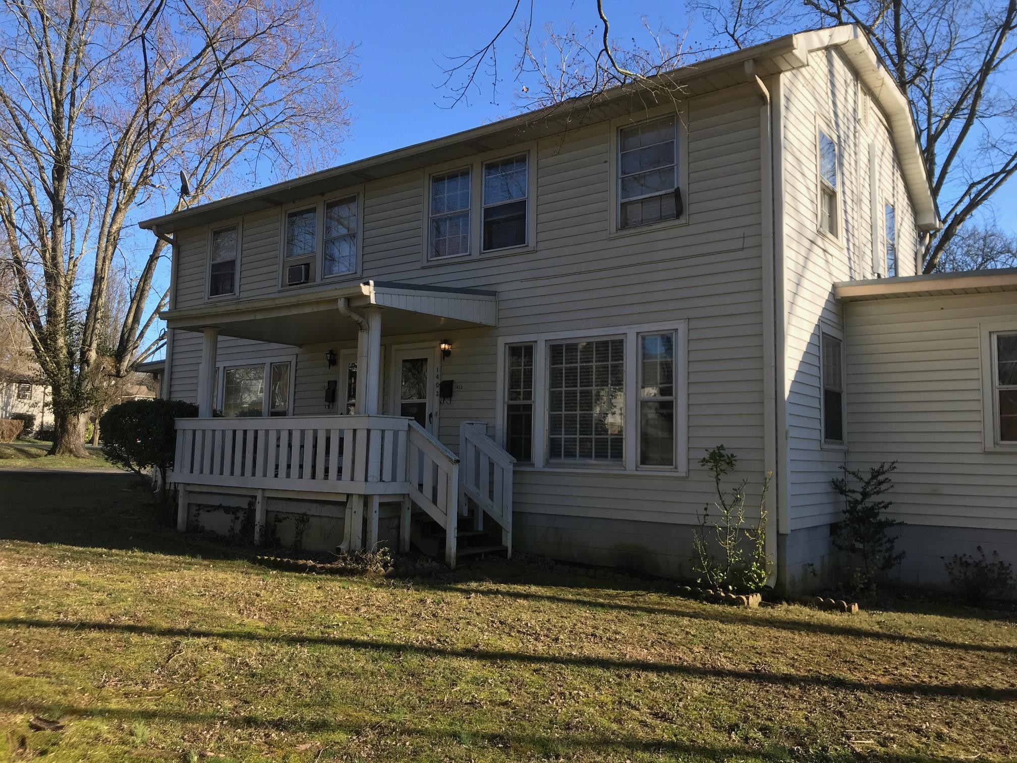 1401 8th Street Old Hickory, TN 37138 - Photo 2 of 14 a view of a house with a window and wooden fence