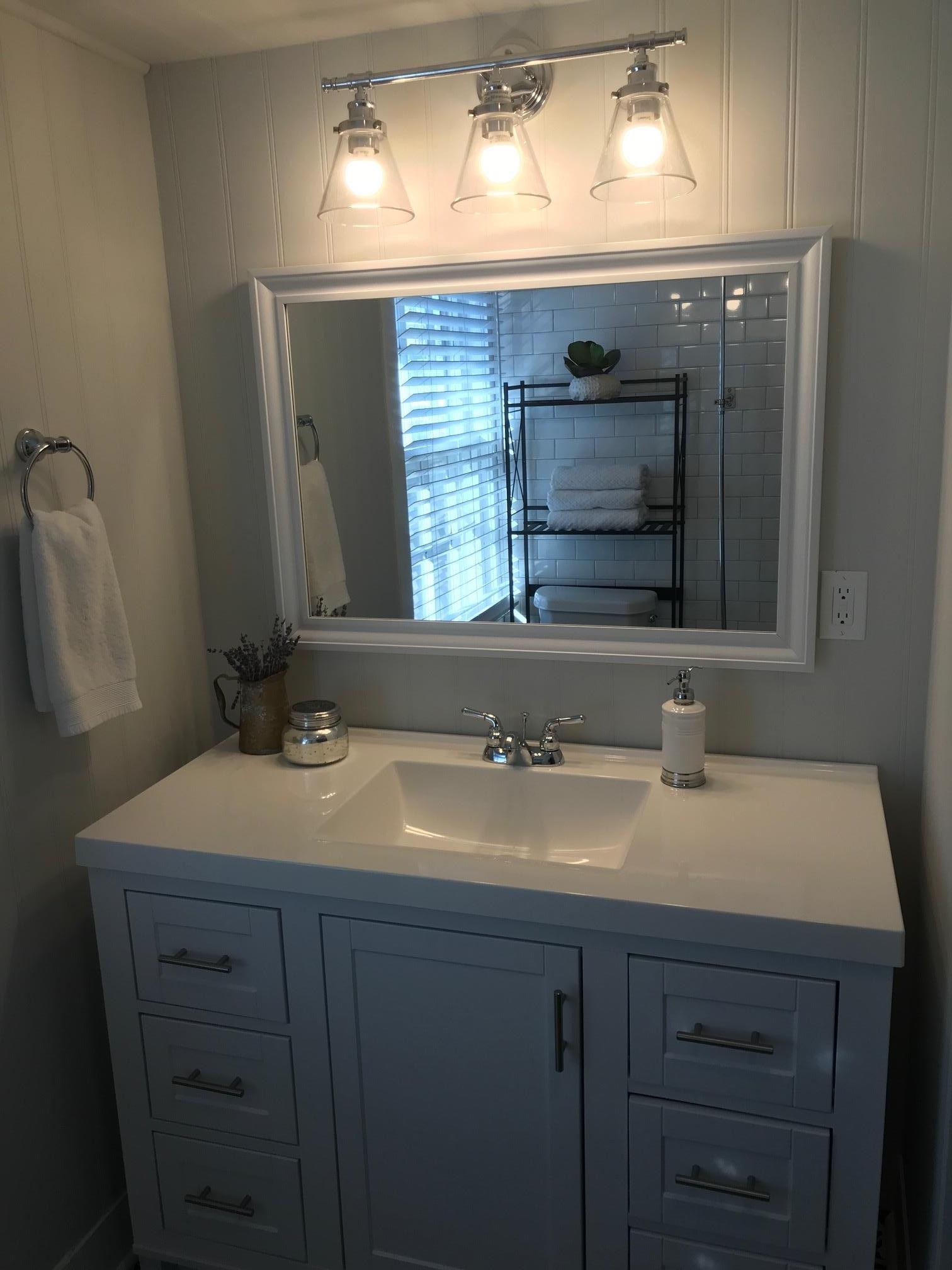 1401 8th Street Old Hickory, TN 37138 - Photo 9 of 14 a bathroom with a sink and a mirror
