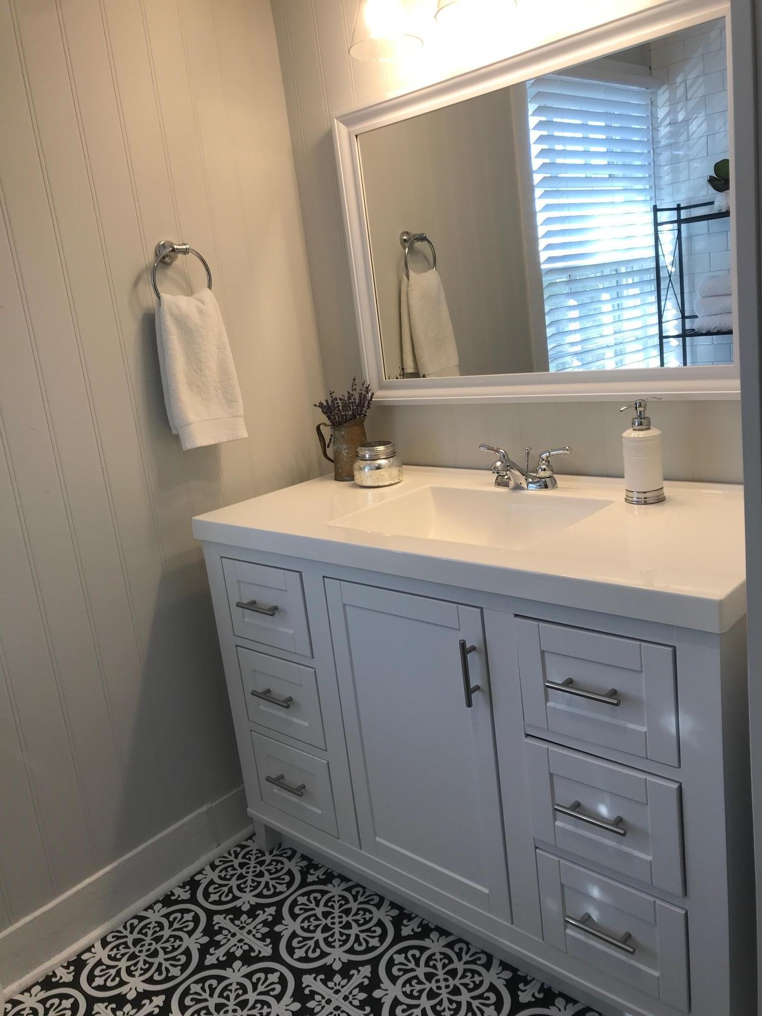 1401 8th Street Old Hickory, TN 37138 - Photo 10 of 14 a bathroom with a sink a vanity and a mirror