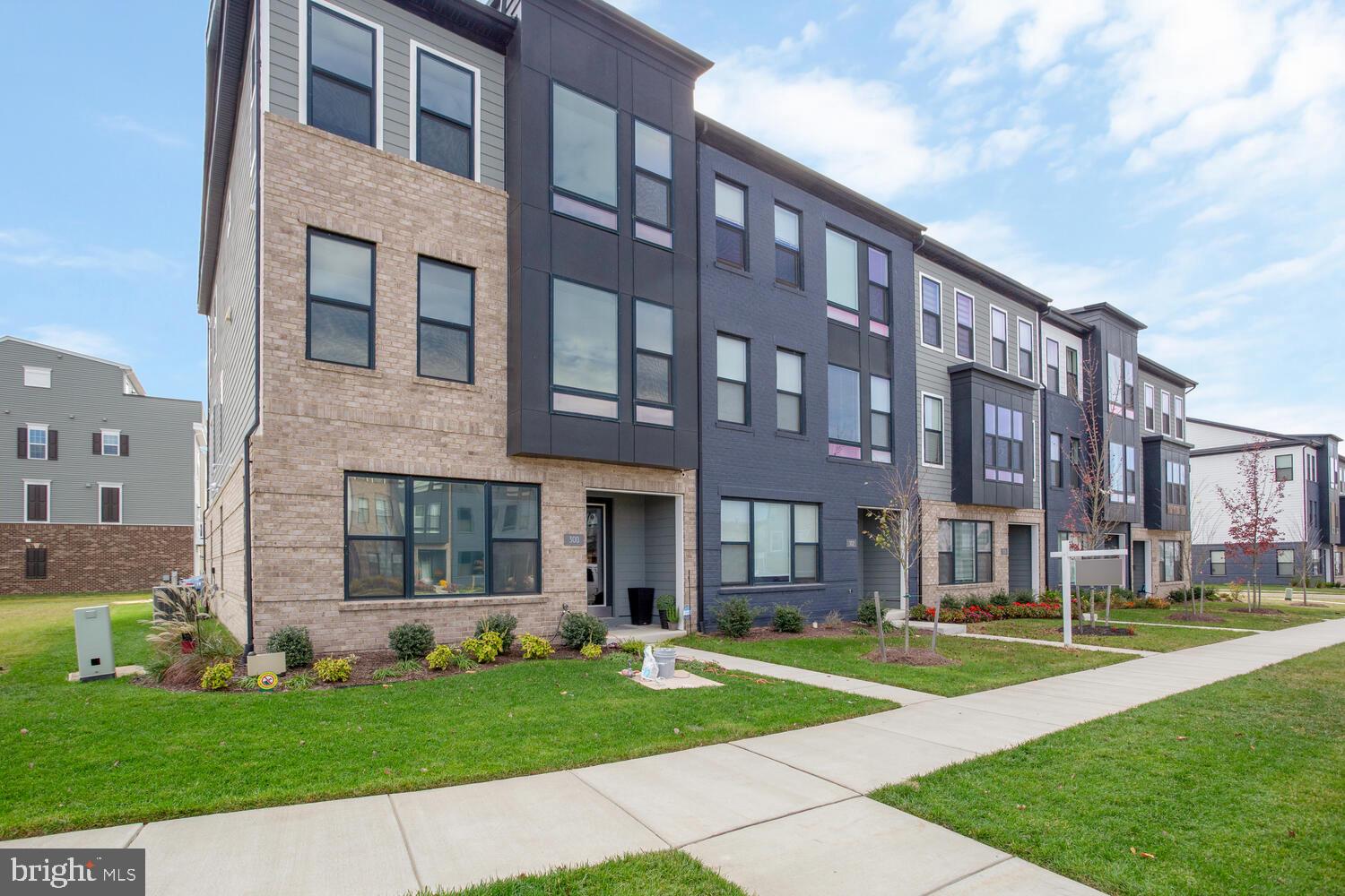 a view of a building with a yard