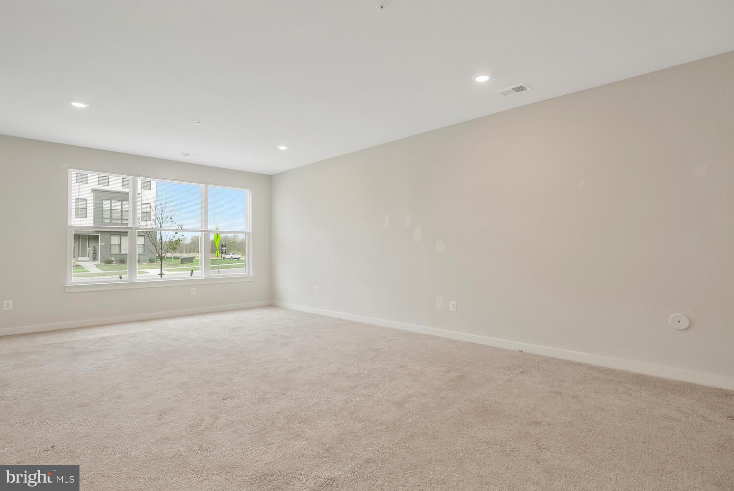 302 Summit Point Boulevard Bowie, MD 20716 - Photo 12 of 30 a view of an empty room with a window