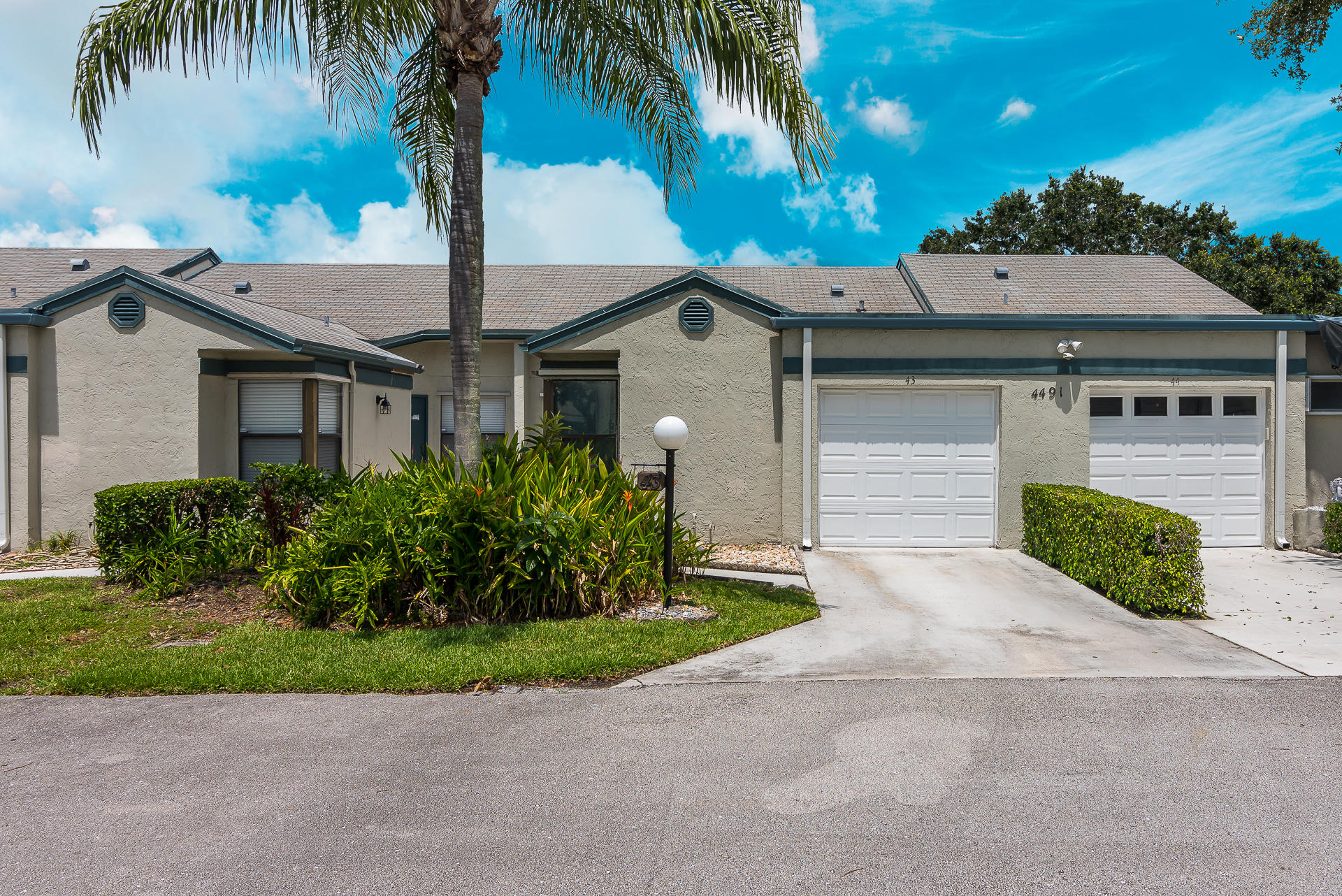 4491 Feivel Road, Unit 43 West Palm Beach, FL 33417 - Photo 2 of 12 Garage and Entrance