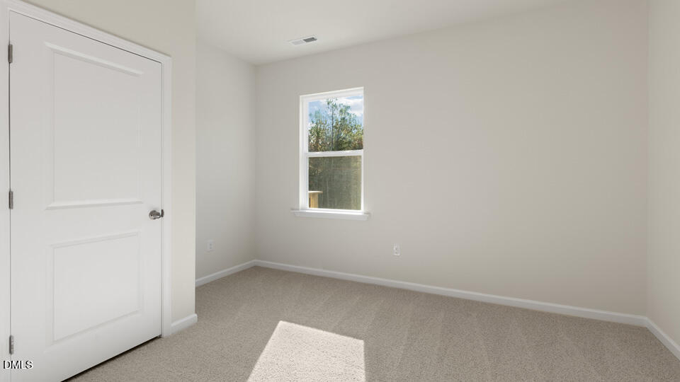 433 Hvn Hl Road Hillsborough, NC 27278 - Photo 20 of 33 an empty room with a window