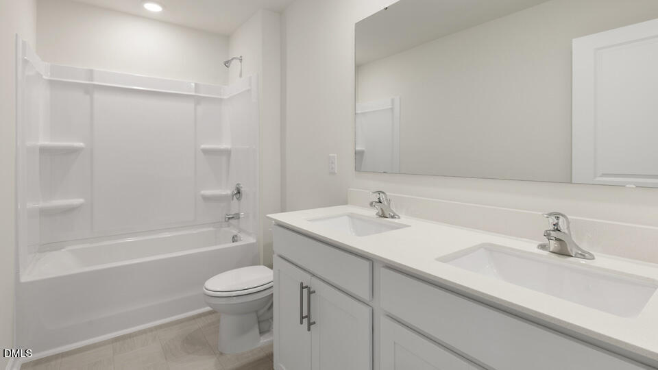 433 Hvn Hl Road Hillsborough, NC 27278 - Photo 25 of 33 a bathroom with a sink a toilet and a bathtub