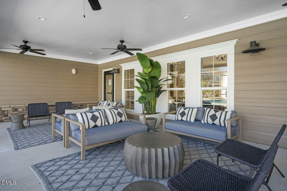 433 Hvn Hl Road Hillsborough, NC 27278 - Photo 32 of 33 a living room with furniture and a large window