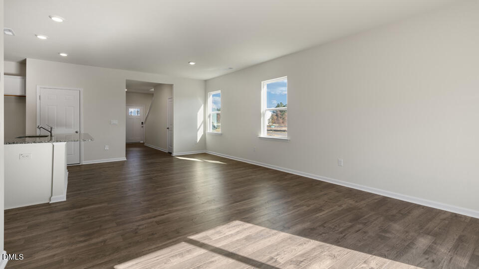 433 Hvn Hl Road Hillsborough, NC 27278 - Photo 9 of 33 a view of a kitchen with wooden floor and a window