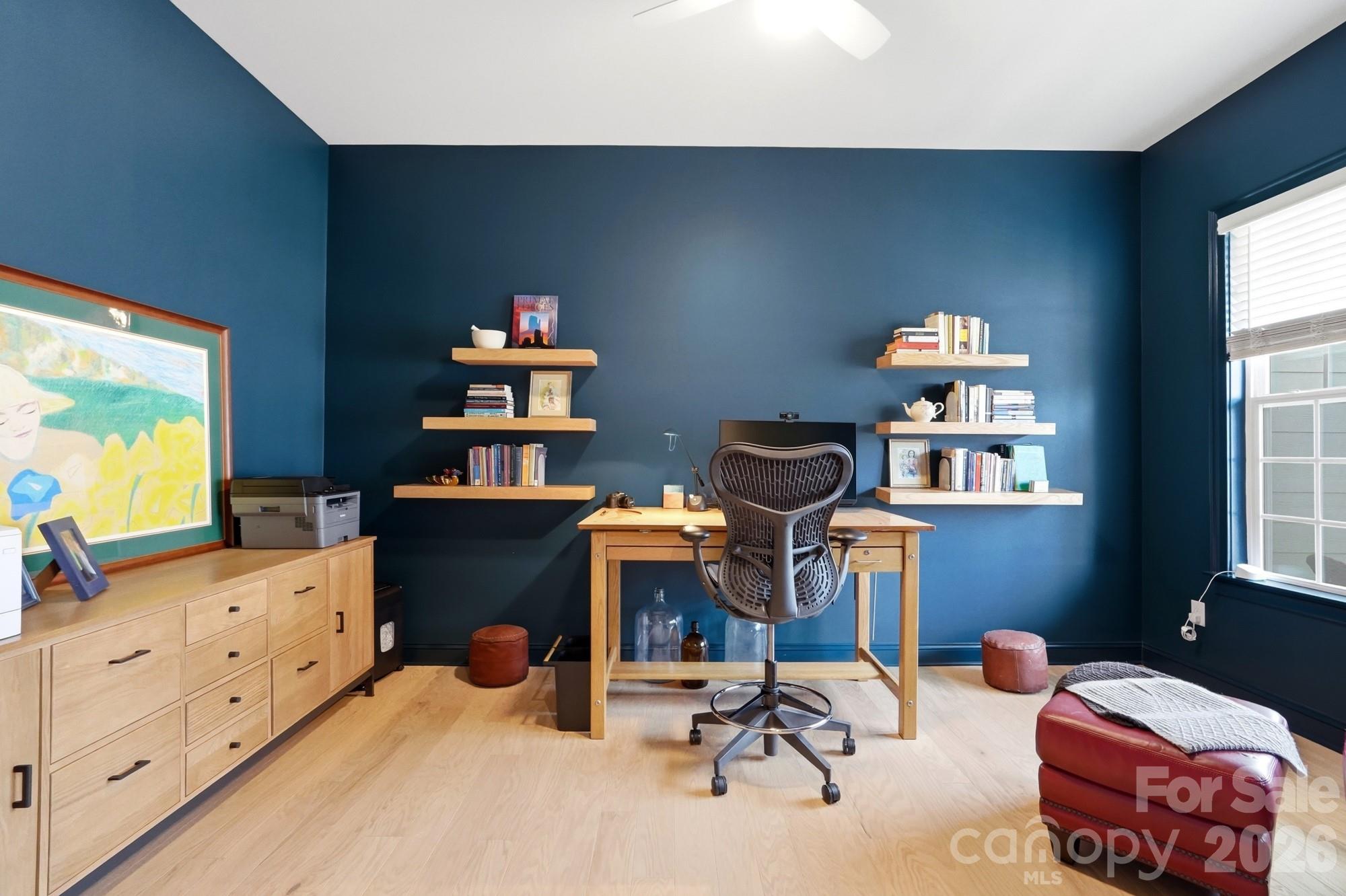 4012 Pollock View Mount Mount Holly, NC 28120 - Photo 21 of 48 a view of a workspace with furniture and a window