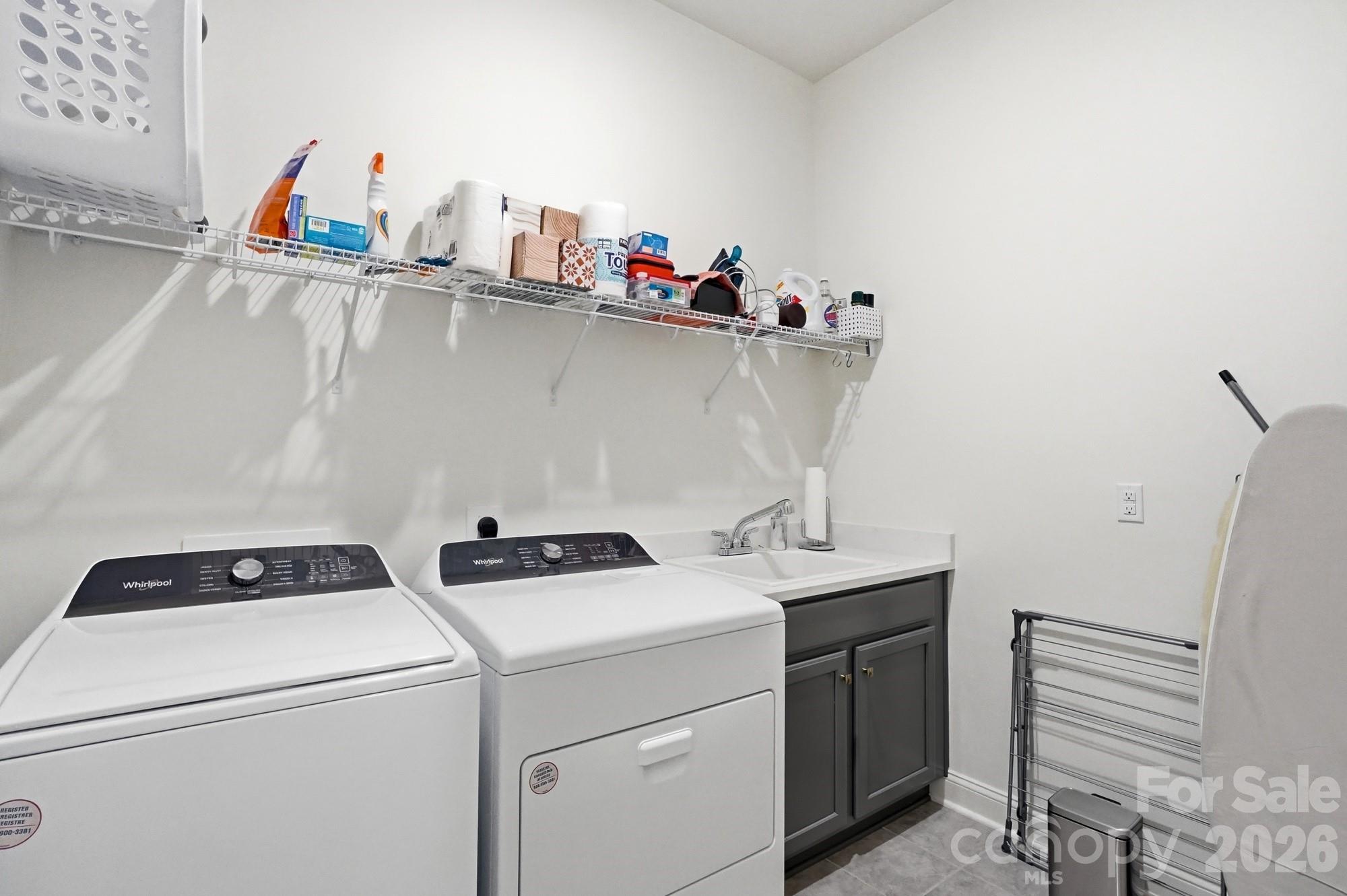 4012 Pollock View Mount Mount Holly, NC 28120 - Photo 22 of 48 a utility room with dryer and washer