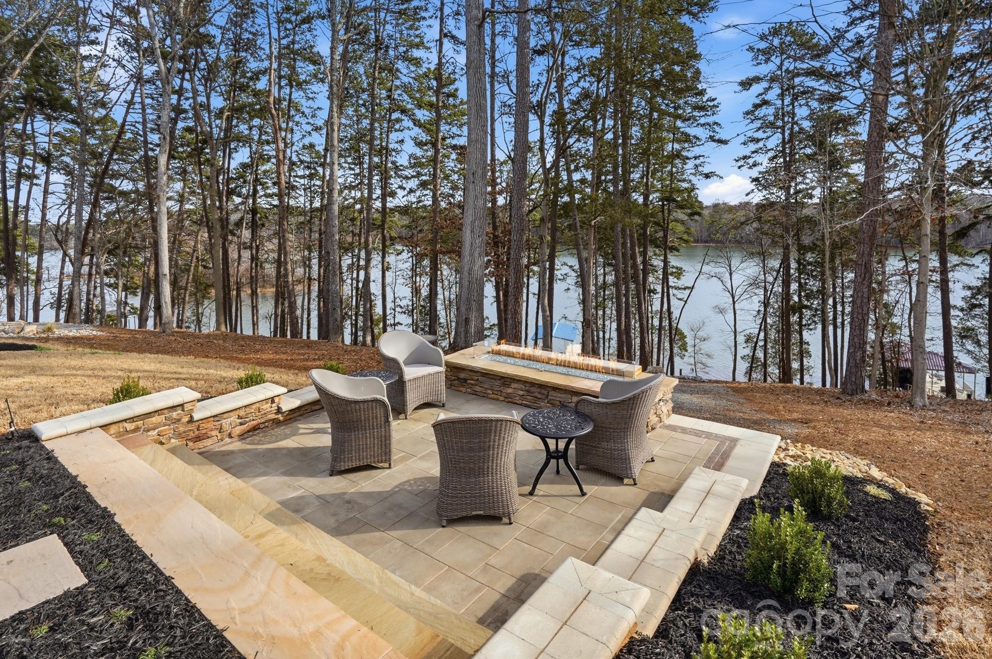 4012 Pollock View Mount Mount Holly, NC 28120 - Photo 25 of 48 a view of a chairs and table in backyard