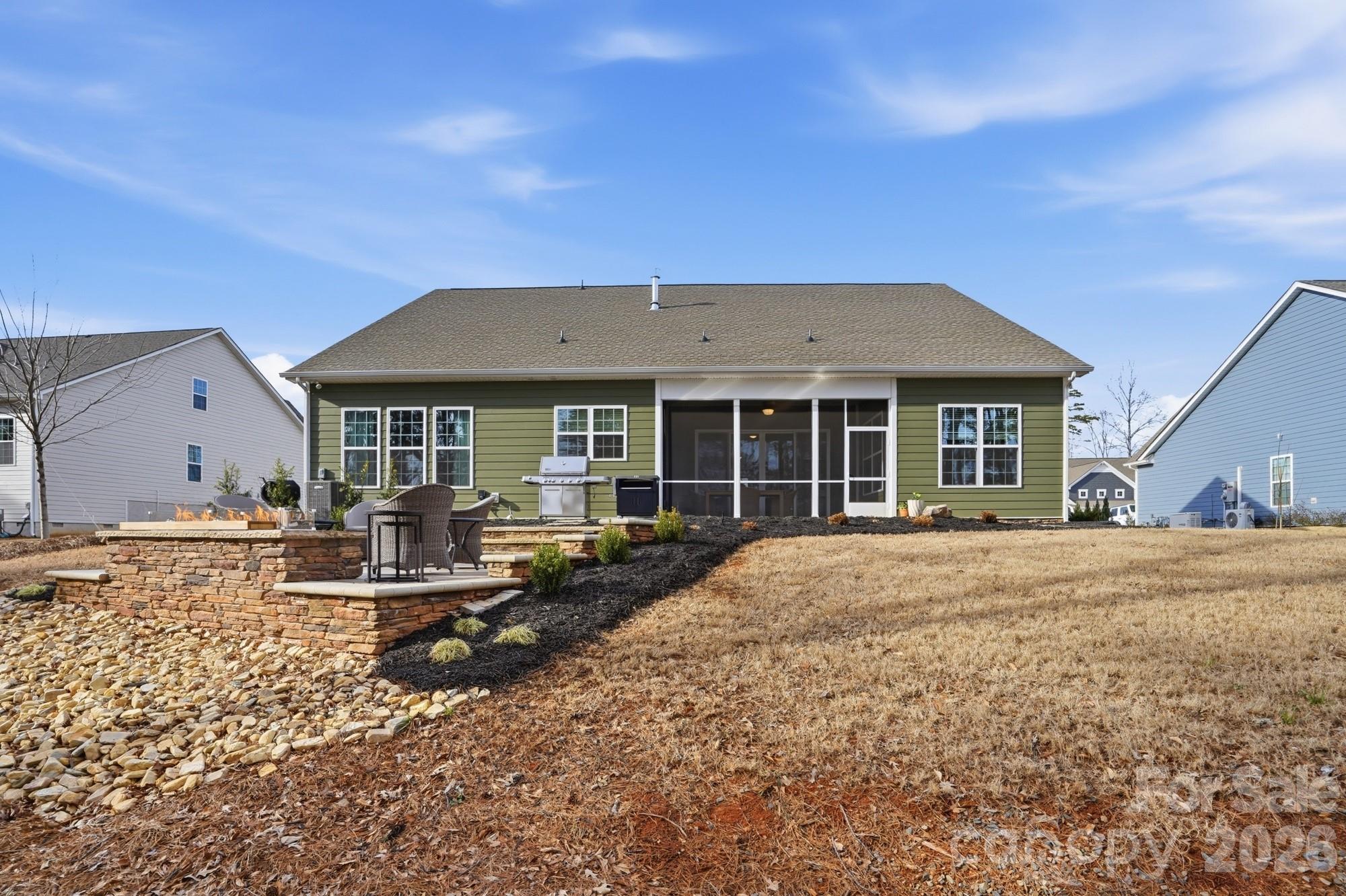 4012 Pollock View Mount Mount Holly, NC 28120 - Photo 30 of 48 a view of a house with backyard sitting area and garden