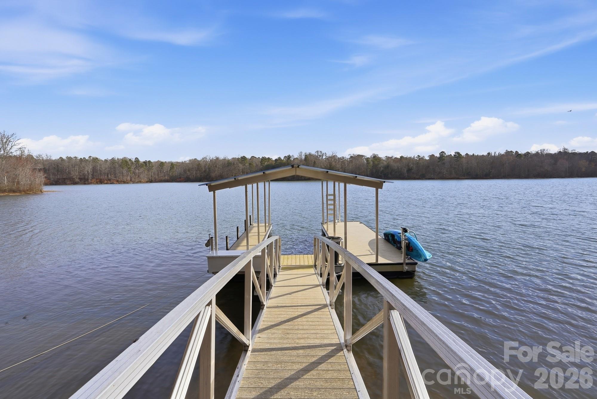 4012 Pollock View Mount Mount Holly, NC 28120 - Photo 33 of 48 a view of a lake with a terrace