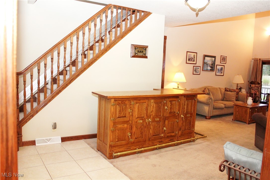 1999 Warner Road Vienna, OH 44473 - Photo 5 of 50 Foyer Entry with Staircase