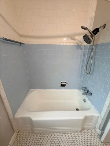 a bathroom with a bathtub