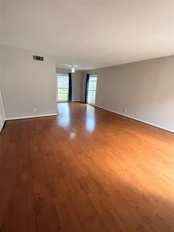 a view of an empty room with window