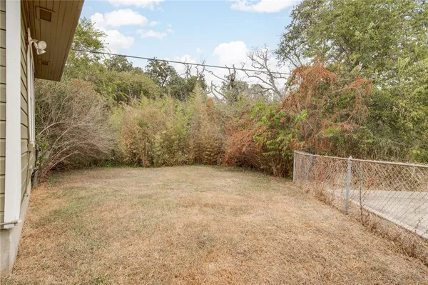 a view of outdoor space and yard