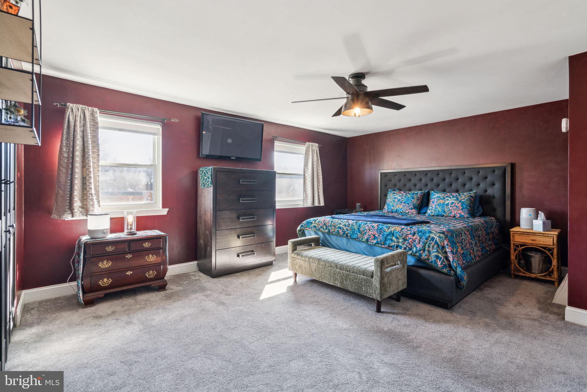 3408 Orion Road Philadelphia, PA 19154 - Photo 29 of 46 a bedroom with a bed and a tv