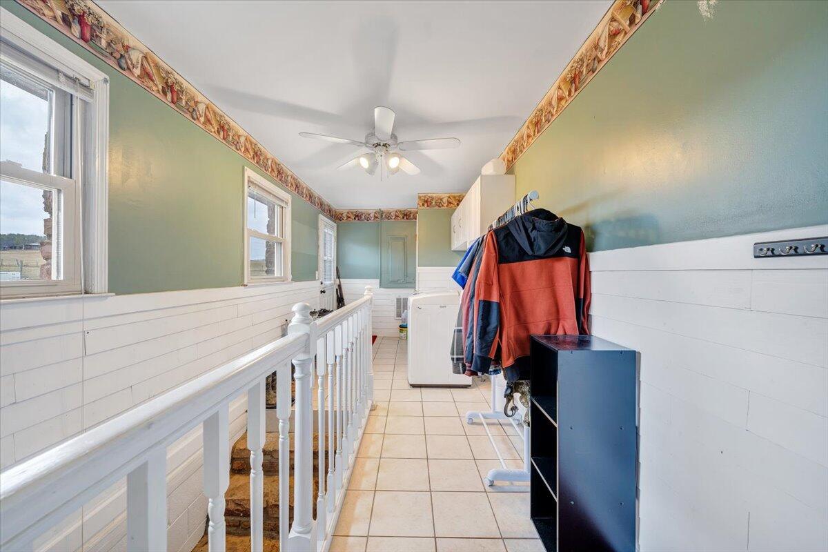 1167 St Peters Road Speedwell, VA 24374 - Photo 6 of 40 a view of walk in closet with clothes and shoes