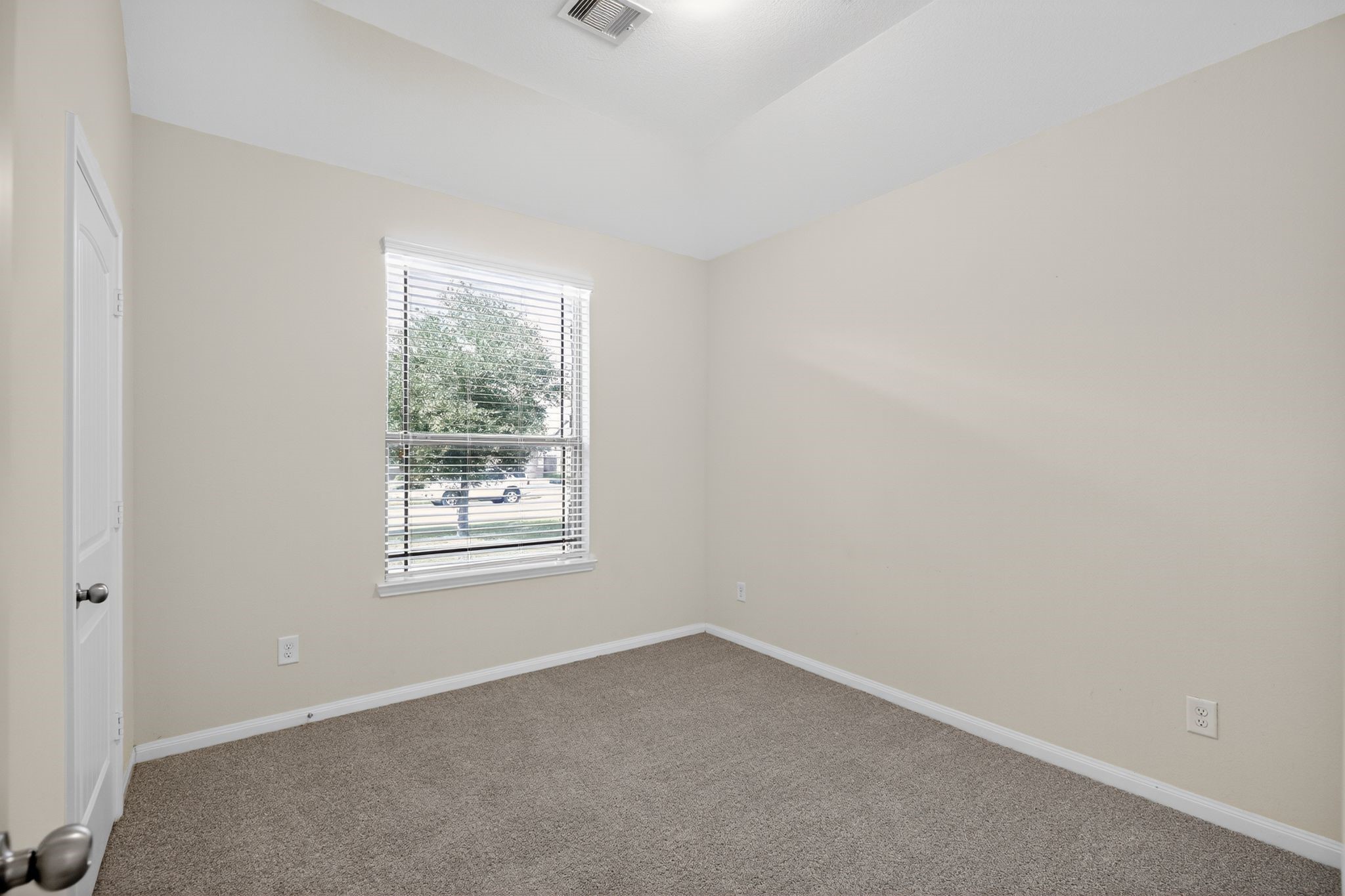22514 Rustic Valley Court Porter, TX 77365 - Photo 16 of 33 an empty room with windows