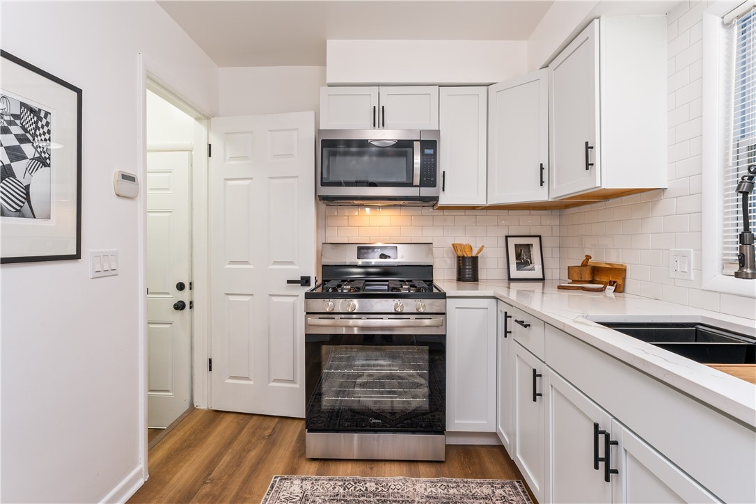 81 Spencerport Road Gates, NY 14606 - Photo 11 of 30 Stainless steel gas stove/oven & microwave