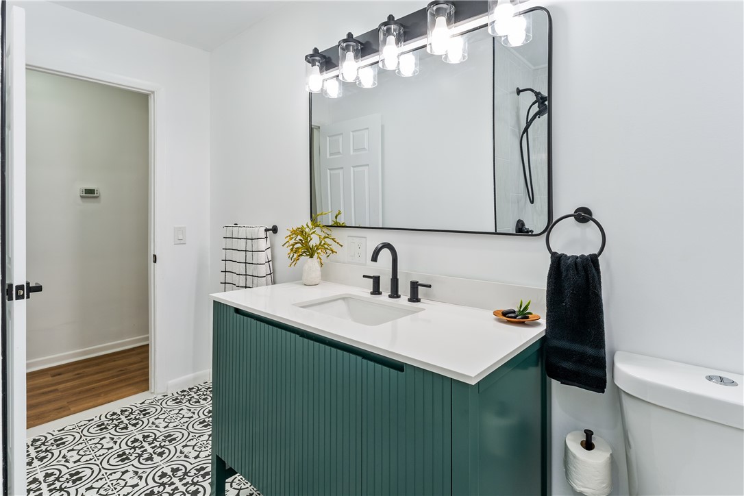 81 Spencerport Road Gates, NY 14606 - Photo 17 of 30 Gorgeous doublewide vanity and mirror with ample l