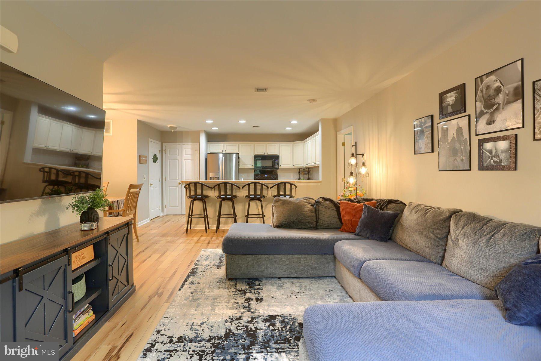 2398 Mill Road Mechanicsburg, PA 17055 - Photo 2 of 24 a living room with furniture and a flat screen tv