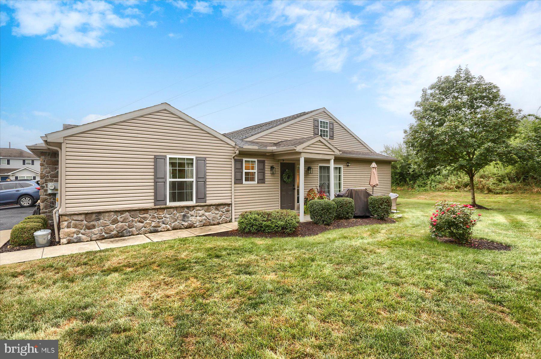 2398 Mill Road Mechanicsburg, PA 17055 - Photo 22 of 24 a view of a house with a yard
