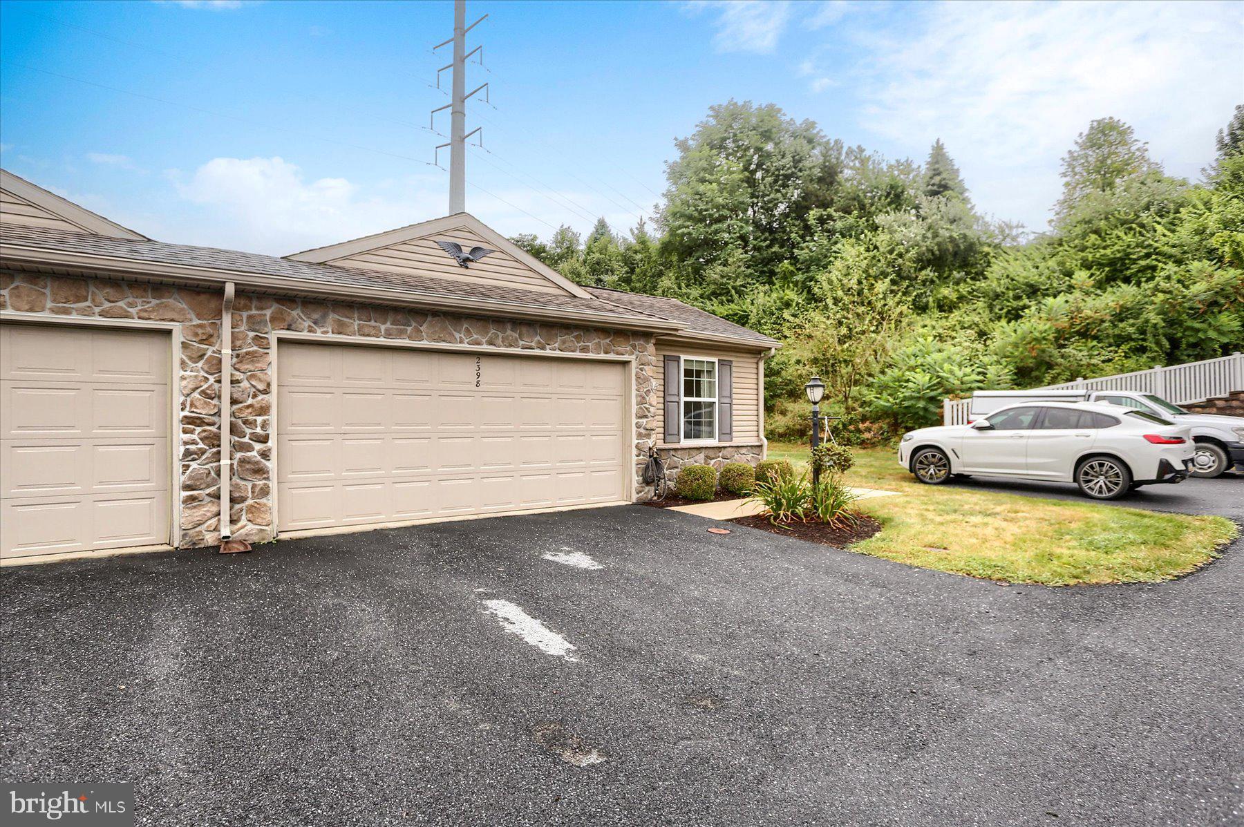 2398 Mill Road Mechanicsburg, PA 17055 - Photo 24 of 24 a view of a house with a backyard and garage