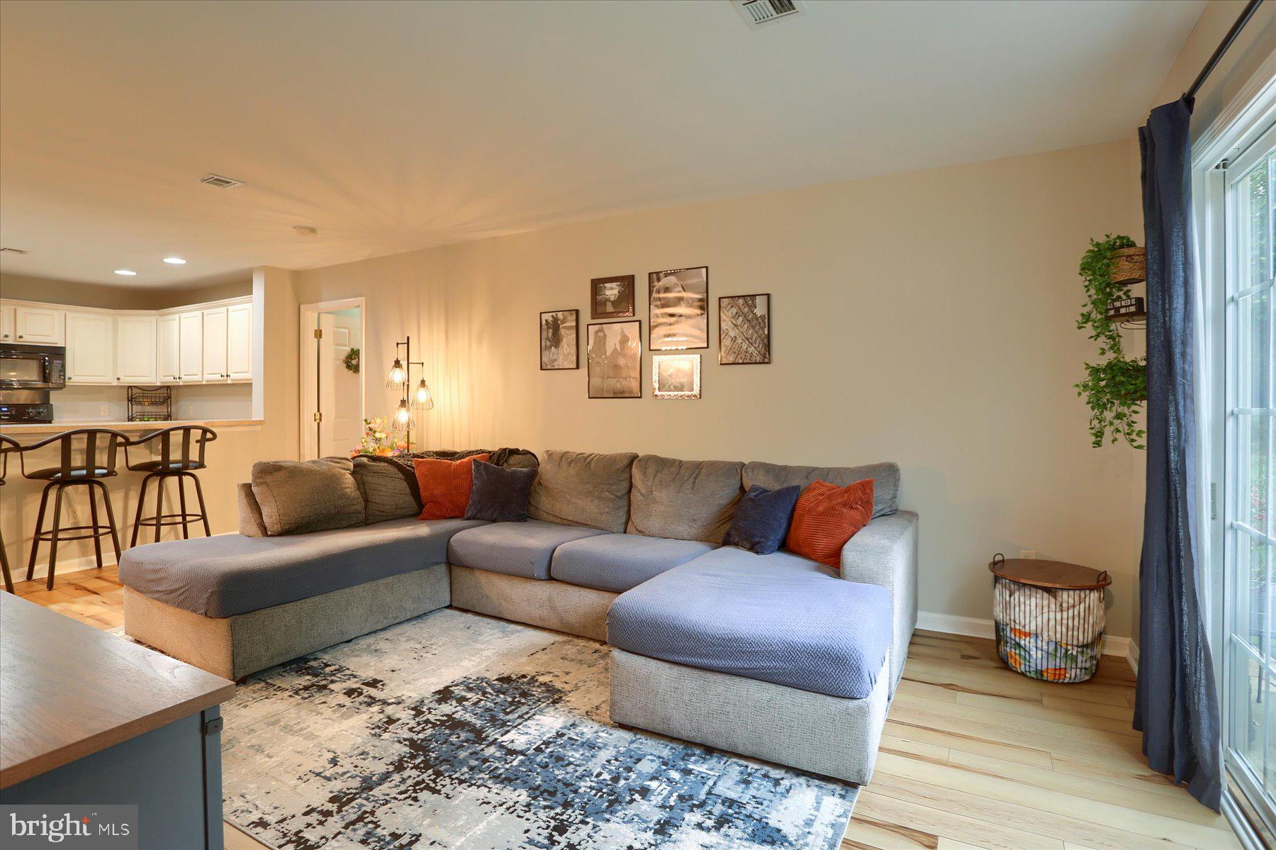 2398 Mill Road Mechanicsburg, PA 17055 - Photo 3 of 24 a living room with furniture and wooden floor