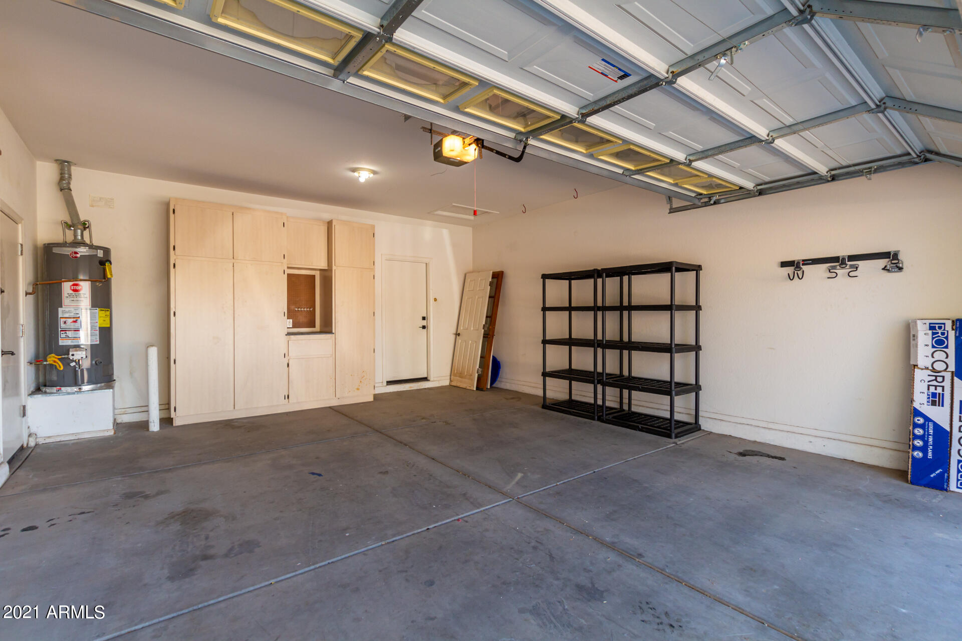 14613 West Redfield Road Surprise, AZ 85379 - Photo 22 of 28 Built in cabinets in 2 car garage