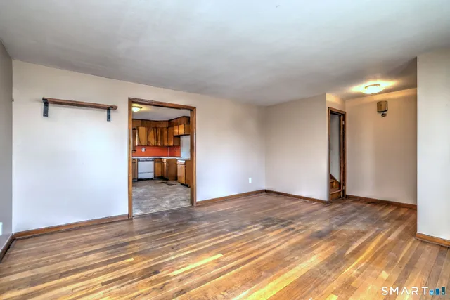 a kitchen with a sink cabinets and window