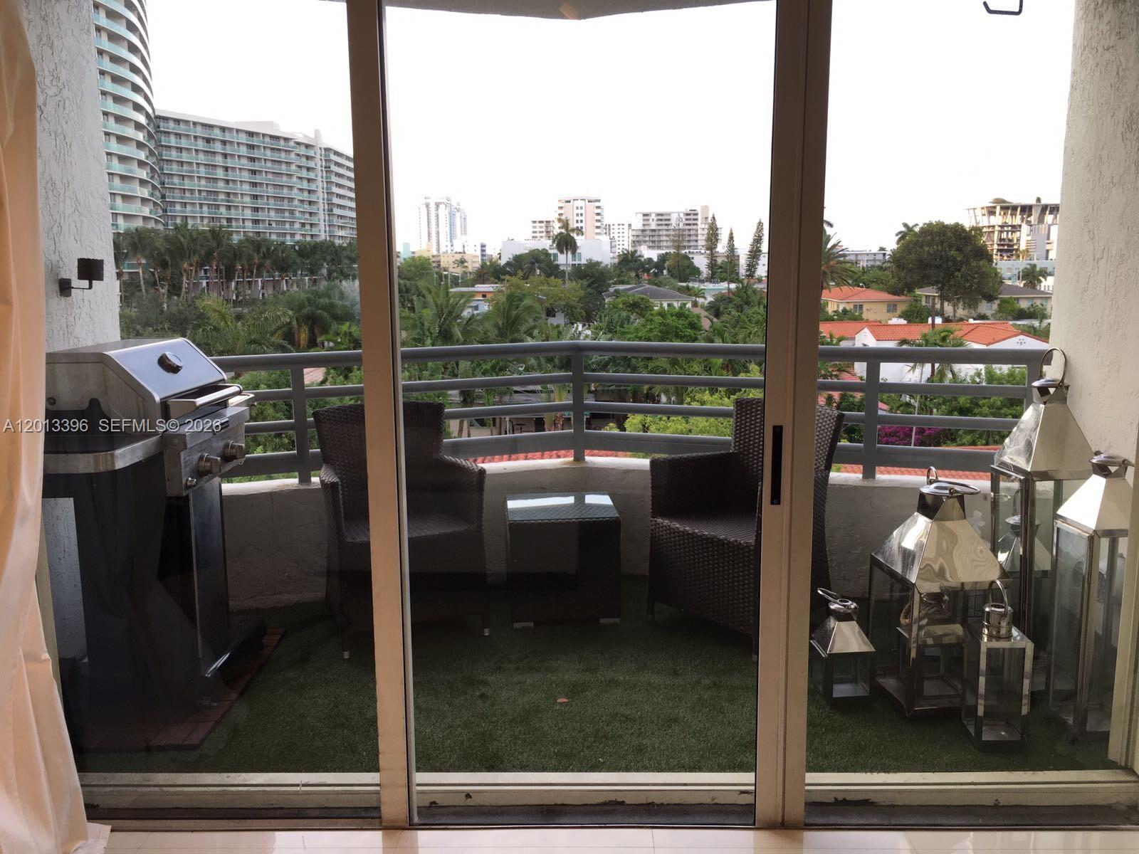 1401 Bay Road, Unit 513 Miami Beach, FL 33139 - Photo 6 of 12 a view of a balcony with a sink